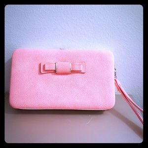 Peach wristlet w/ pink inside, can hold phone&more